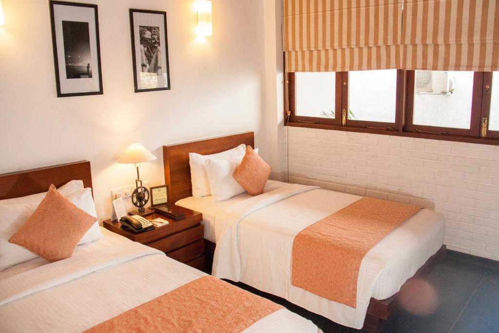 Двухместный (Двухместный номер Делюкс с 2 отдельными кроватями) отеля Colombo Court Hotel & Spa, Коломбо