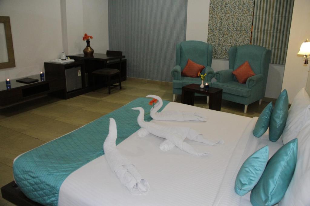 Двухместный (Улучшенный двухместный номер с 1 кроватью или 2 отдельными кроватями) отеля Hotel Apple Inn, Джайпур