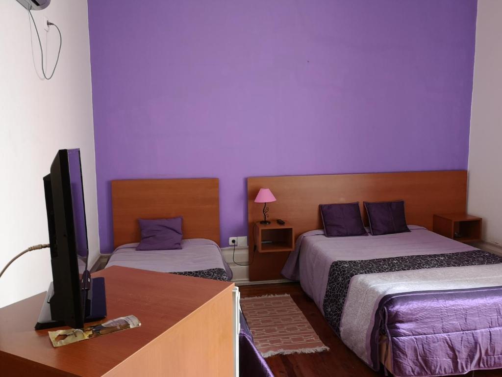 Двухместный (Двухместный номер с двуспальной кроватью и дополнительной кроватью) гостевого дома Sao Juliao, Фигейра-да-Фош