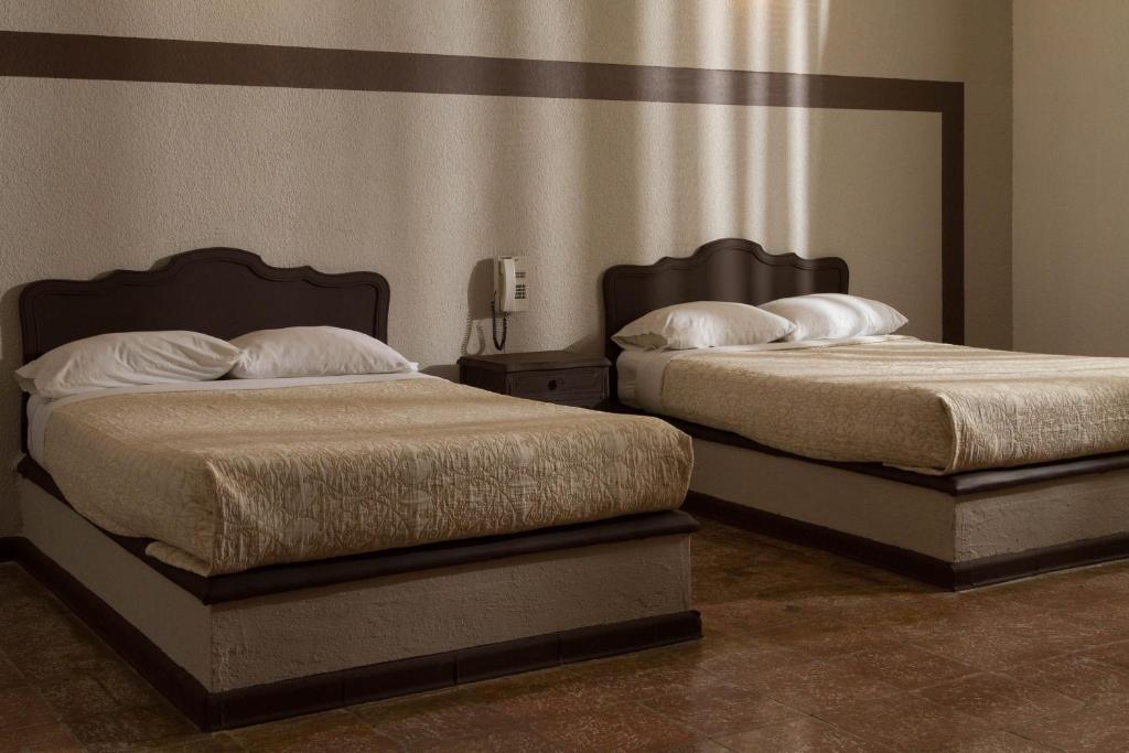 Семейный (Двухместный номер с 2 двуспальными кроватями) отеля La Gloria de Calvillo, Кальвильо