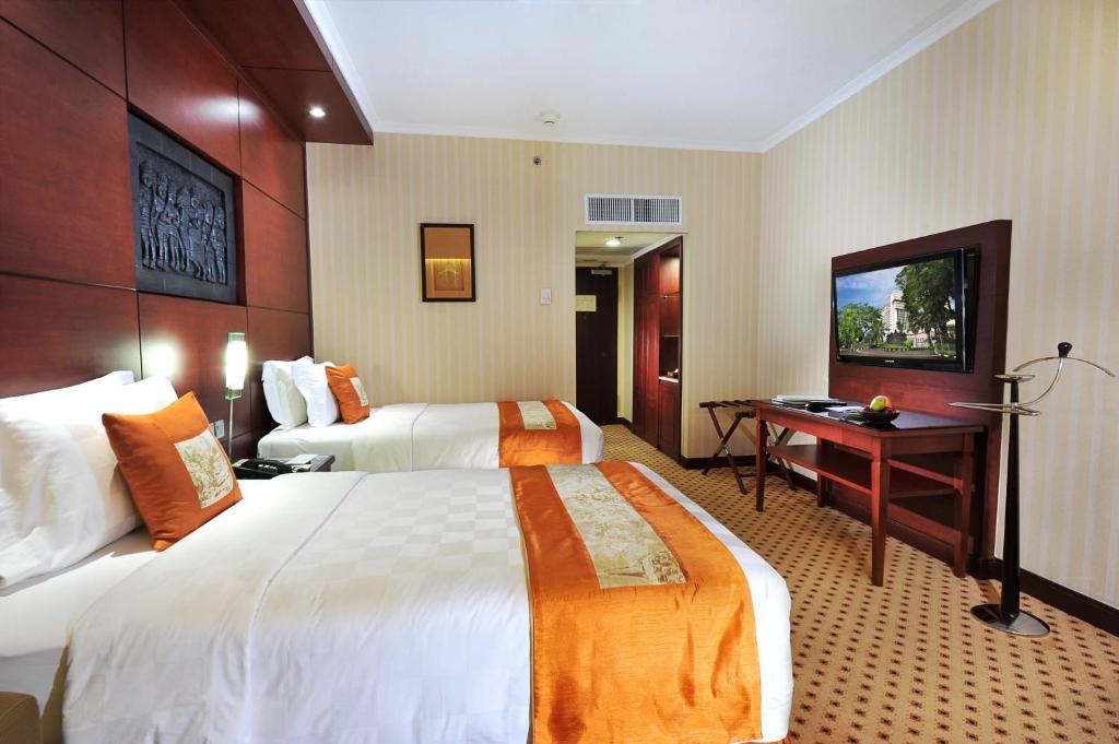 Двухместный (Улучшенный двухместный номер с 2 отдельными кроватями) отеля Hotel Borobudur Jakarta, Джакарта