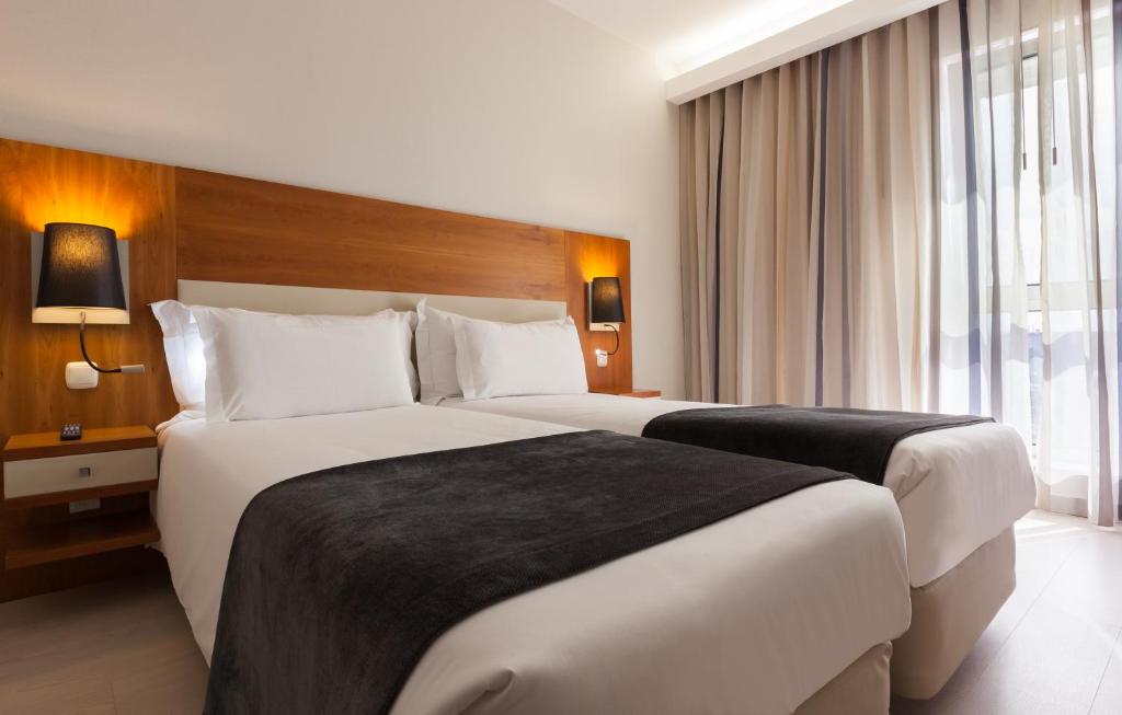Двухместный (Стандартный двухместный номер с 2 отдельными кроватями) отеля Hotel Mercure Lisboa, Лиссабон