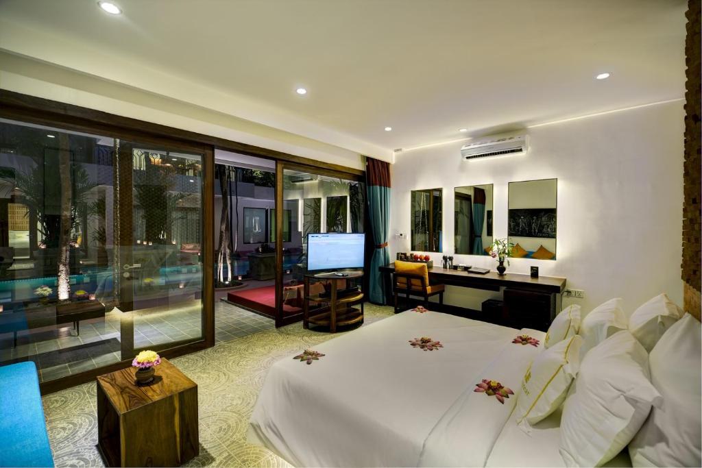 Двухместный (Роскошный двухместный номер с 1 кроватью и доступом к бассейну - Специальное предложение) отеля Golden Temple Retreat, Сием Рип