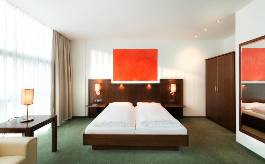 Двухместный (Улучшенный двухместный номер с 1 кроватью) отеля Hotel City, Филлах