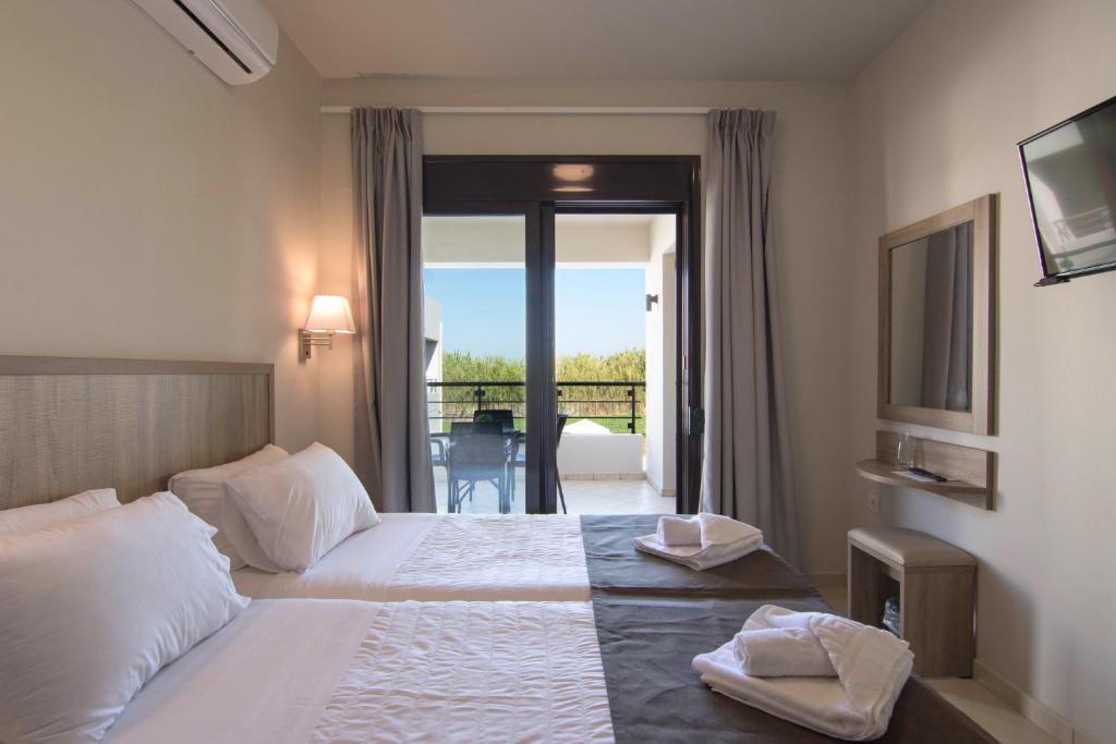 Двухместный (Двухместный номер Делюкс с 1 кроватью и балконом) отеля Carisa Maleme, Малеме
