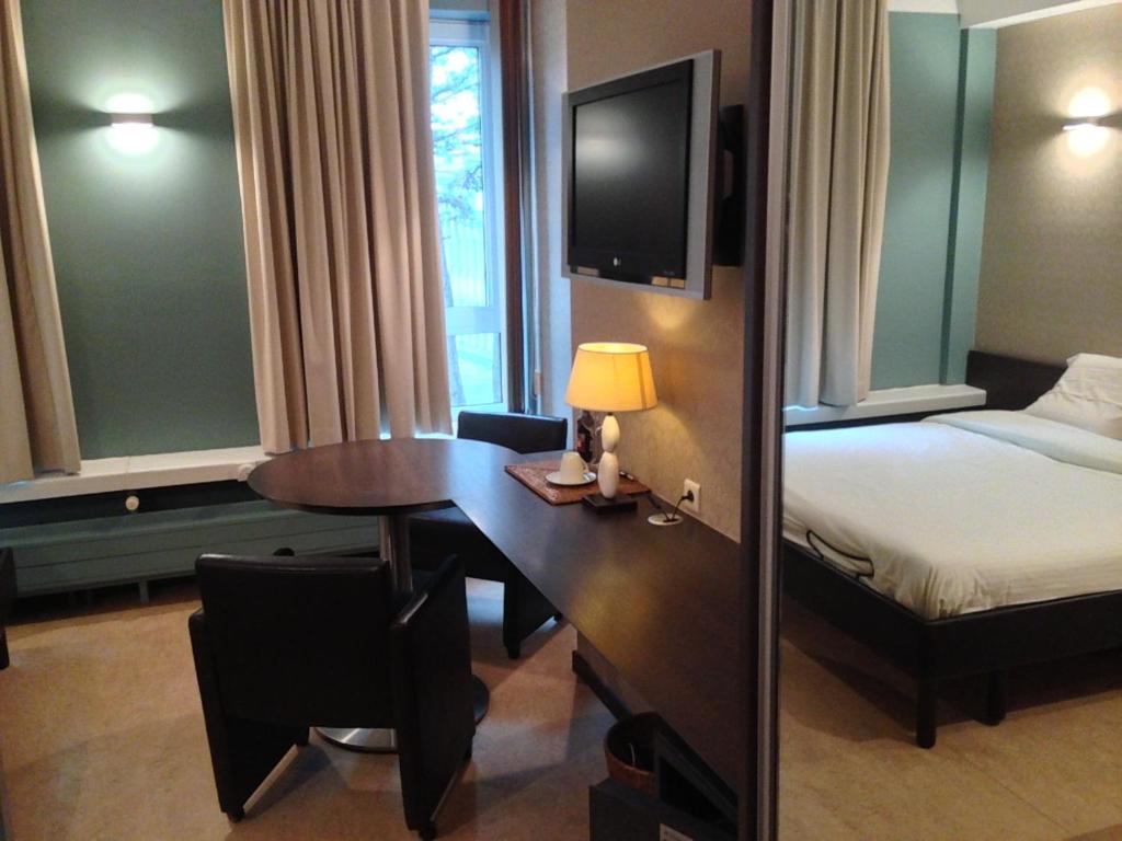 Двухместный (Стандартный двухместный номер с 1 кроватью или 2 отдельными кроватями) отеля Hotel Orion, Гент