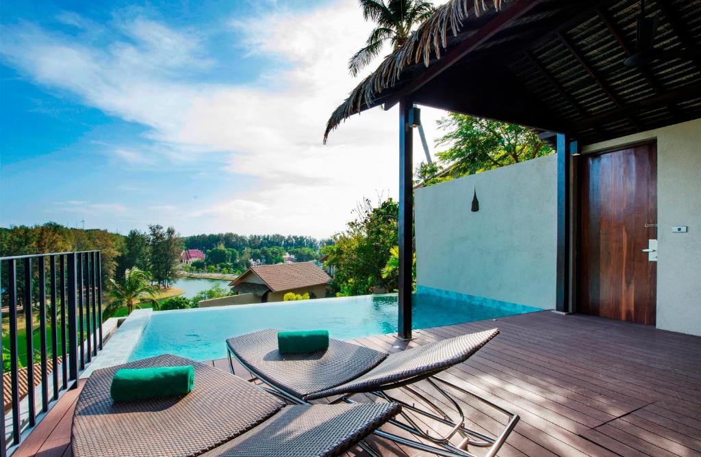 Вилла (Вилла «Гранд» с видом на бассейн) курортного отеля Sunsuri Phuket, Пхукет