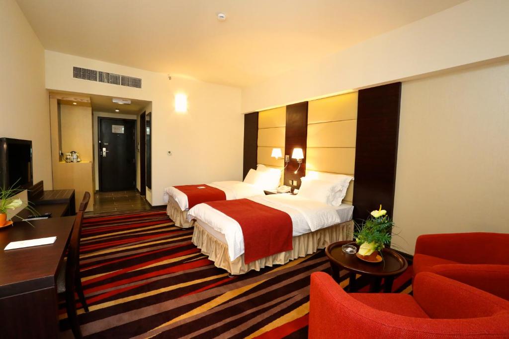 Двухместный (Стандартный двухместный номер с 1 кроватью или 2 отдельными кроватями) отеля Nehal by Bin Majid, Абу-Даби