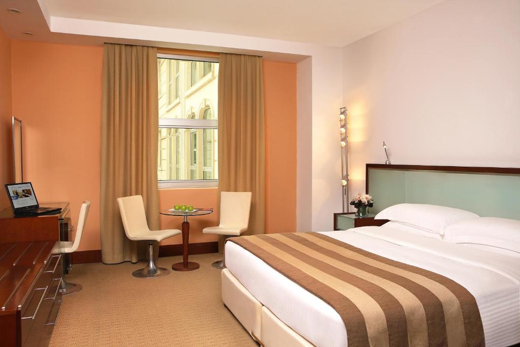Сьюит (Классический люкс с кроватью размера «king-size») апарт-отеля Villa Rotana - Dubai, Дубай