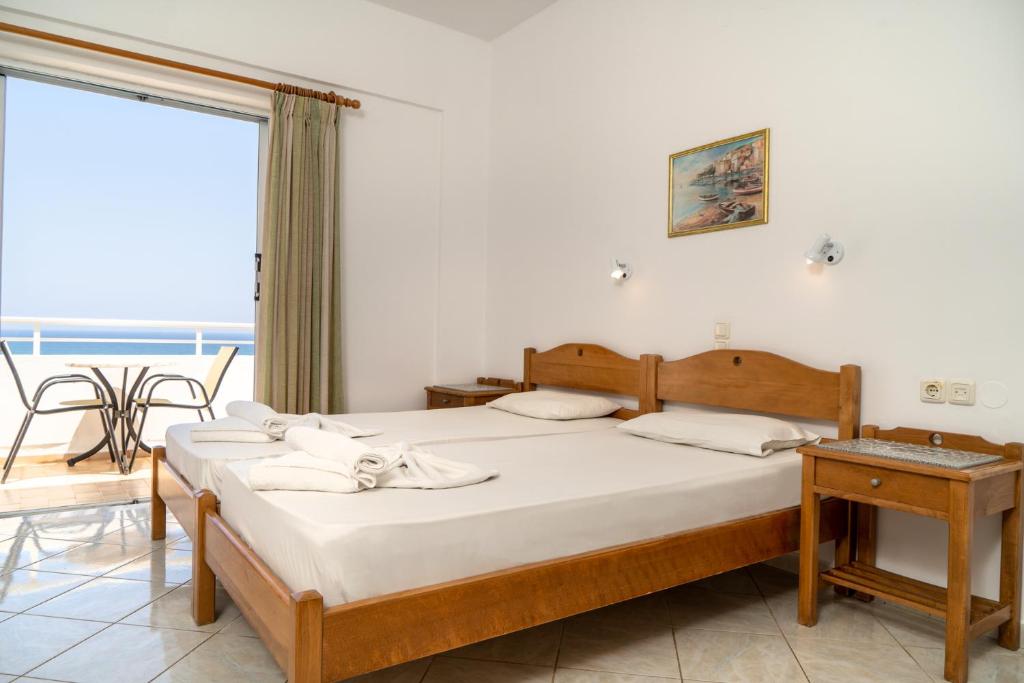 Двухместный (Двухместный номер с 2 отдельными кроватями и видом на море) отеля Hotel Mimoza, Агия-Марина-Неа-Кидон