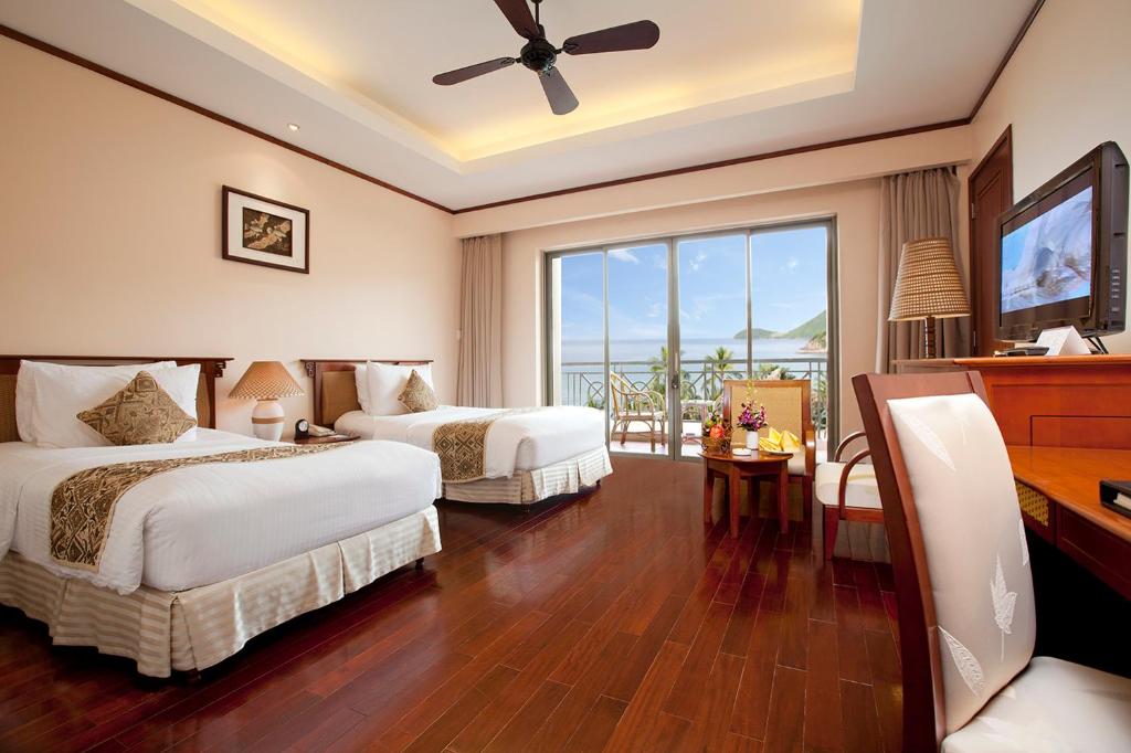 Двухместный (Двухместный номер Делюкс с 2 отдельными кроватями и видом на море — только завтрак) курортного отеля Vinpearl Nha Trang Resort, Вин Нгуен