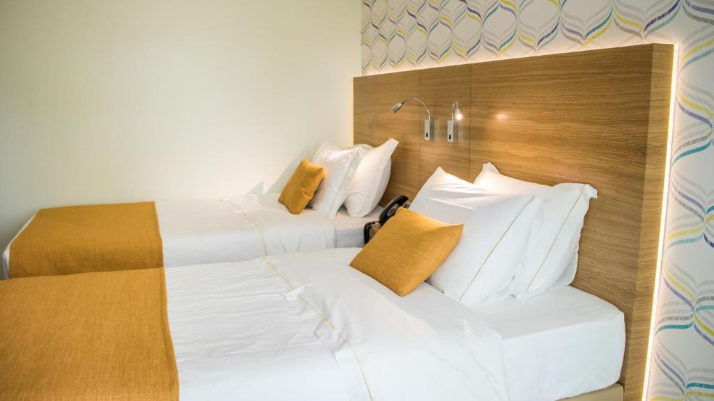 Двухместный (Двухместный номер с 2 отдельными кроватями) отеля Hotel Império do Norte, Понте-де-Лима