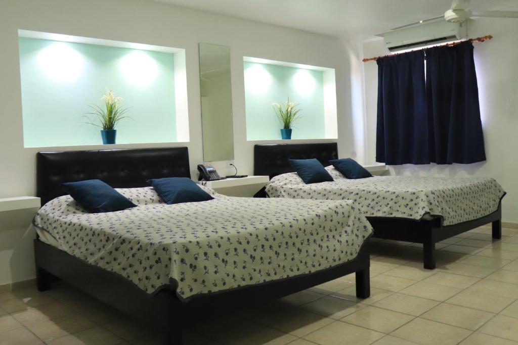 Двухместный (Двухместный номер с 2 отдельными кроватями) отеля Esmeralda, Санто-Доминго