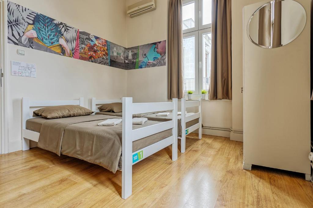 Двухместный (Двухместный номер с 1 кроватью или 2 отдельными кроватями и собственной внешней ванной комнатой) отеля Booking BnB, Белград