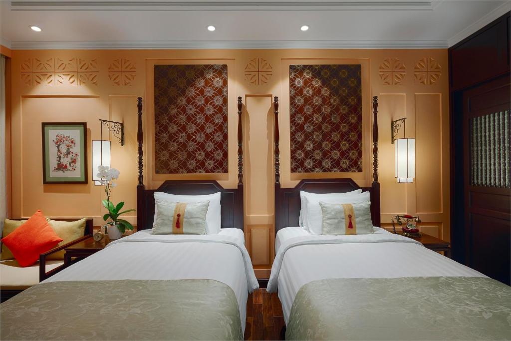 Сьюит (Люкс с 2 отдельными кроватями и видом на реку) отеля Little Riverside Hoi An . A Luxury Hotel & Spa, Хойан