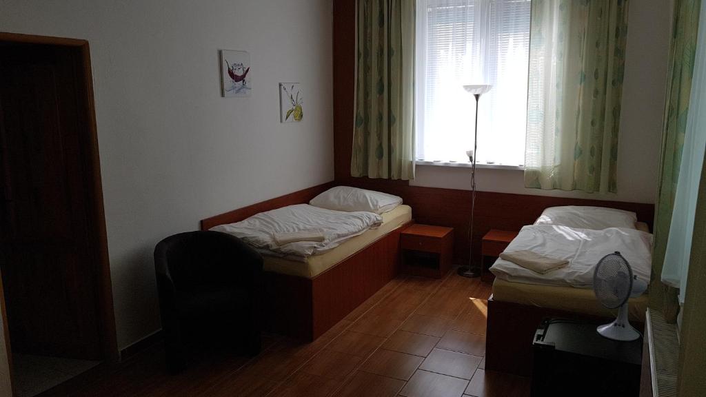 Двухместный (Классический двухместный номер с 1 кроватью или 2 отдельными кроватями) отеля Penzion PKO Nitra, Нитра