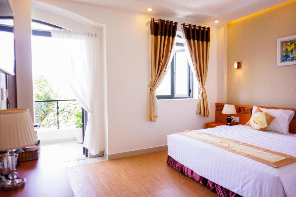 Двухместный (Двухместный номер с 1 кроватью или 2 отдельными кроватями и балконом) отеля NỮ HOÀNG HOTEL, Фанранг