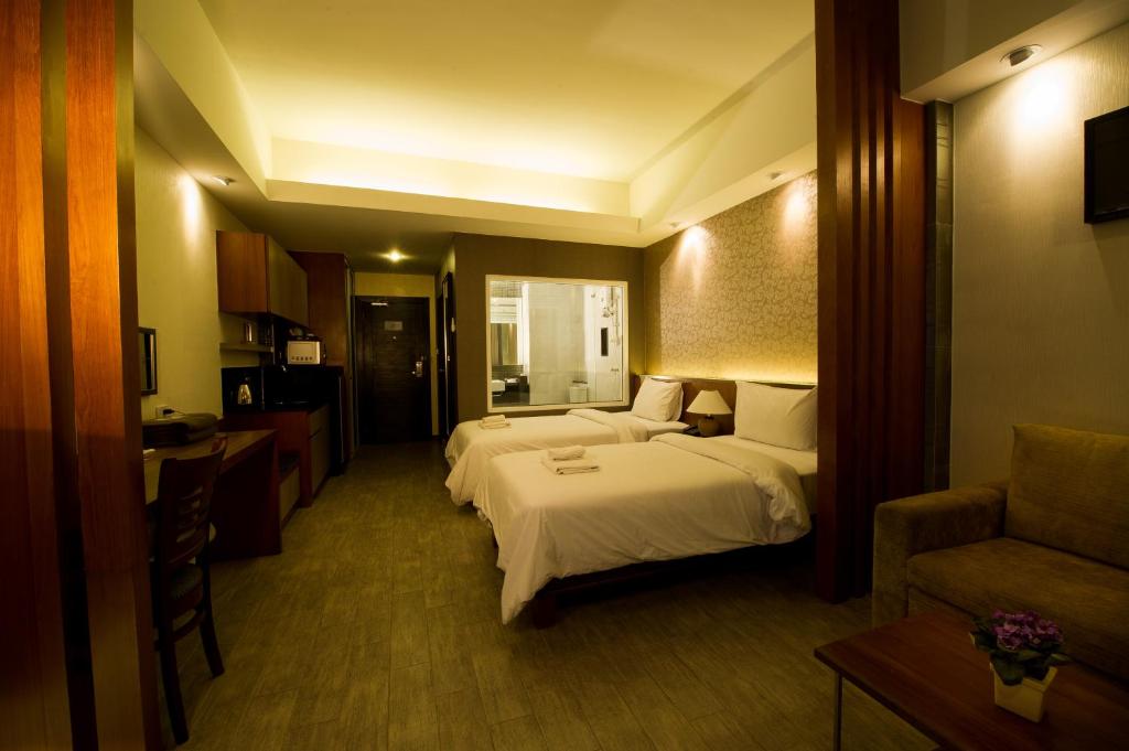Двухместный (Двухместный номер Делюкс с 2 отдельными кроватями) отеля Inn Residence Serviced Suites, Паттайя