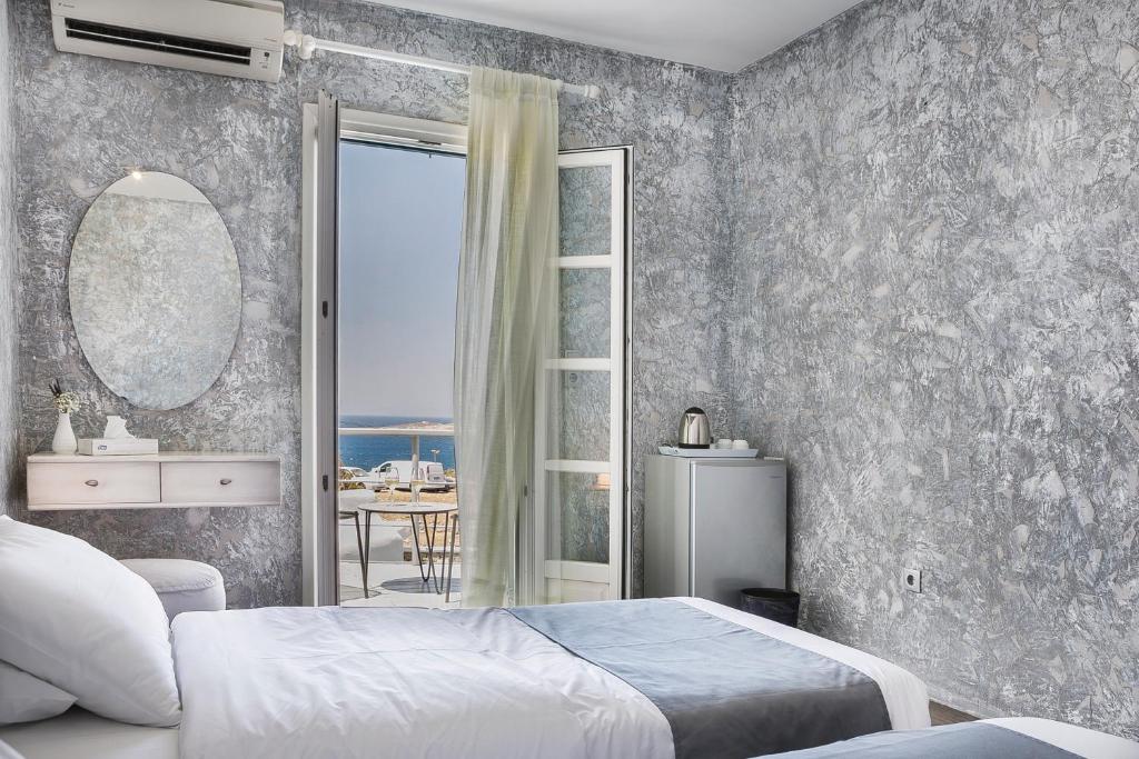 Двухместный (Двухместный номер с 1 кроватью или 2 отдельными кроватями и видом на море) отеля Ilio Maris, Миконос
