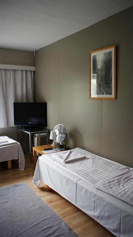 Трехместный (Трехместный номер с общим душем) мотеля Citimotel, Лаппеенранта