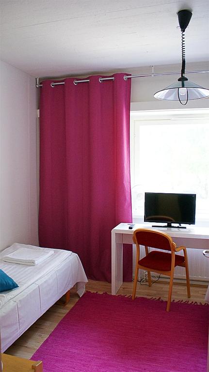 Двухместный (Двухместный номер с 2 отдельными кроватями и общей душевой) мотеля Citimotel, Лаппеенранта