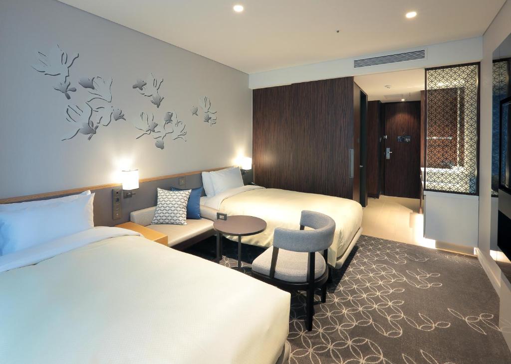 Двухместный (Двухместный номер Делюкс с 2 отдельными кроватями, парковка не предусмотрена) отеля Hotel Gracery Seoul, Сеул
