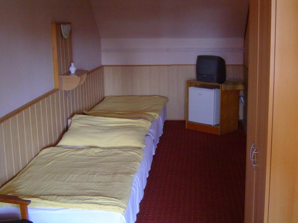 Двухместный (Двухместный номер с 2 отдельными кроватями) гостевого дома Lunczer Vendégház, Мошонмадьяровар