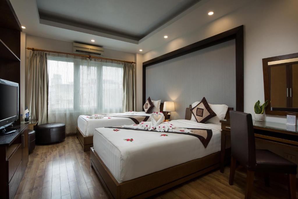 Двухместный (Двухместный номер Делюкс с 2 отдельными кроватями) отеля Splendid Star Grand Hotel, Ханой