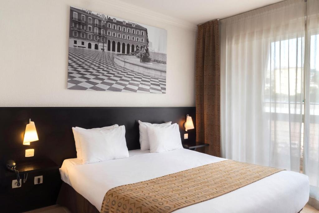 Апартаменты (Апартаменты с 1 спальней и видом на город (для 4 взрослых)) апарт-отеля Aparthotel Adagio Nice Promenade des Anglais, Ницца