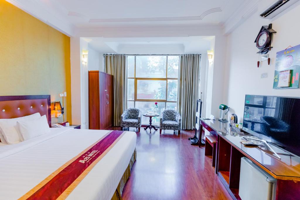 Двухместный (Улучшенный двухместный номер с 1 кроватью или 2 отдельными кроватями) мотеля A25 Hotel - Tue Tinh, Ханой