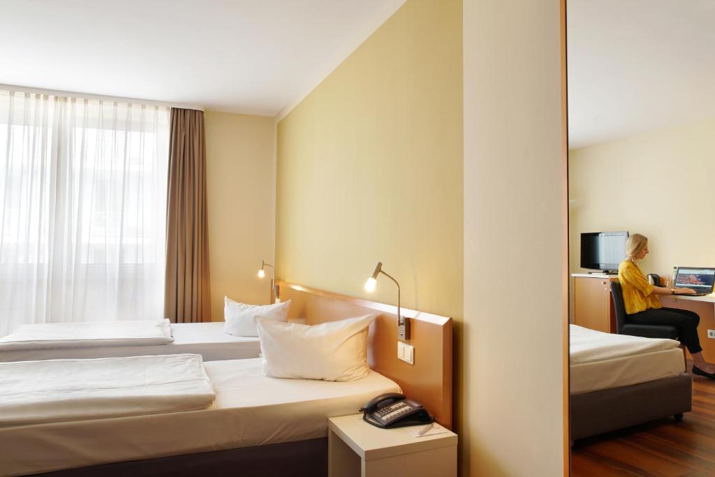 Двухместный (Стандартный двухместный номер с 1 кроватью или 2 отдельными кроватями) отеля Best Western Macrander Hotel Dresden, Дрезден