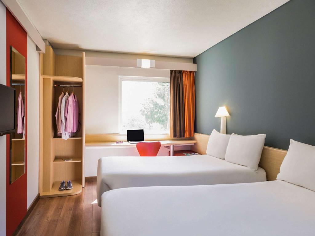 Двухместный (Стандартный двухместный номер с 2 двуспальными кроватями) отеля Ibis Mexico Perinorte, Мехико