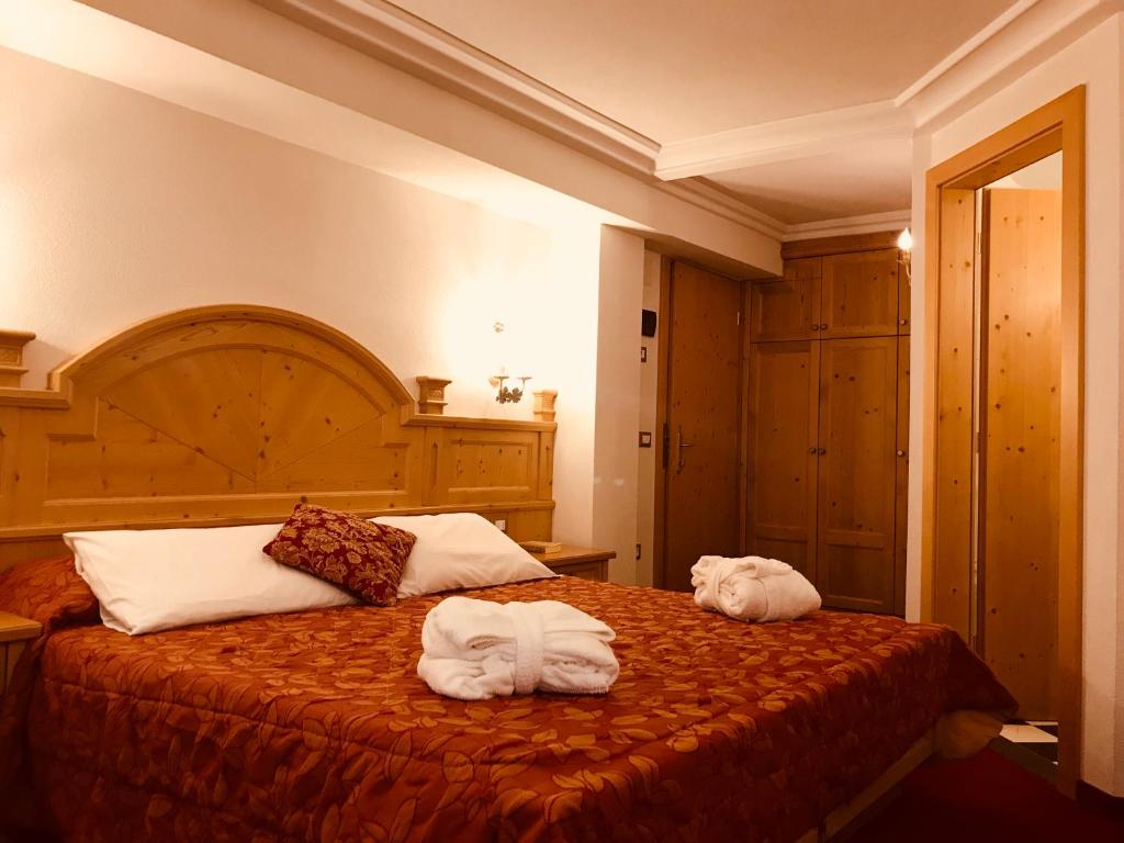 Двухместный (Двухместный номер «Комфорт» с 1 кроватью или 2 отдельными кроватями) отеля Sporthotel Romantic Plaza, Мадонна-ди-Кампильо