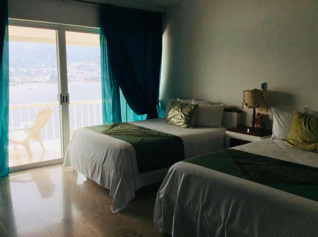 Двухместный (Двухместный номер с 2 отдельными кроватями и балконом) гостевого дома Pier d Luna, Акапулько-де-Хуарес