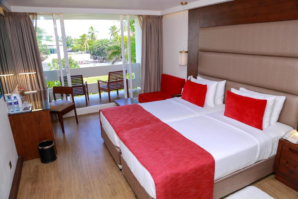 Двухместный (Двухместный номер Делюкс с 1 кроватью или 2 отдельными кроватями, вид на сад) отеля Pegasus Reef Hotel, Ваттала