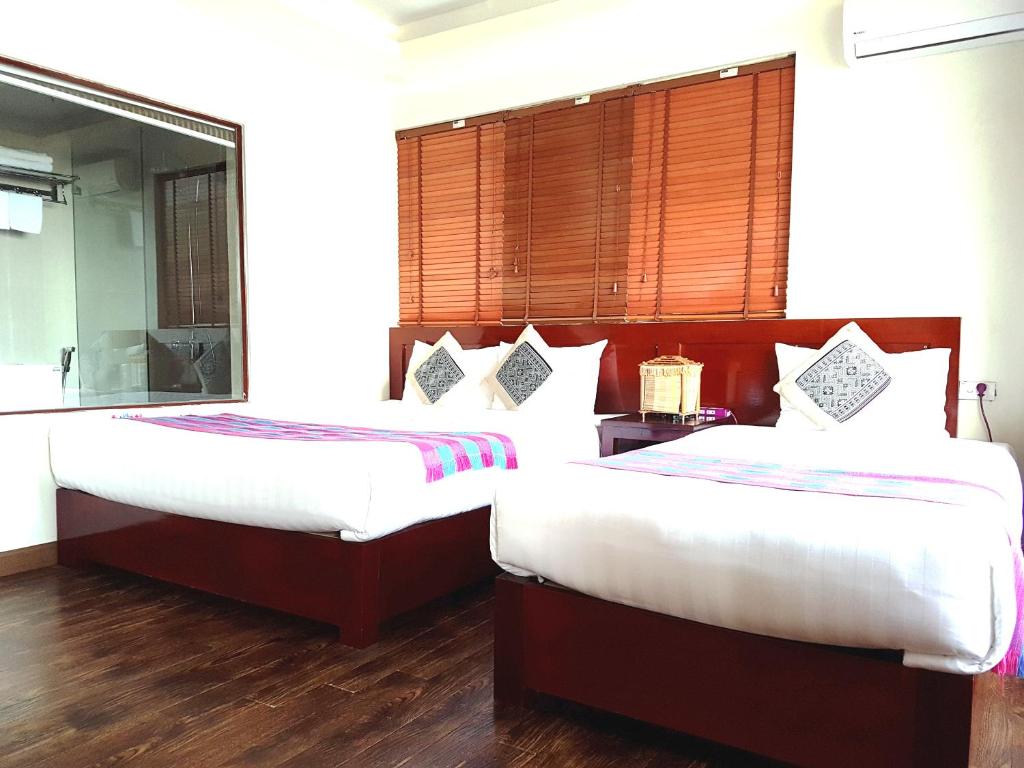 Двухместный (Двухместный номер Делюкс с 2 отдельными кроватями) отеля Botanic Sapa Hotel, Сапа