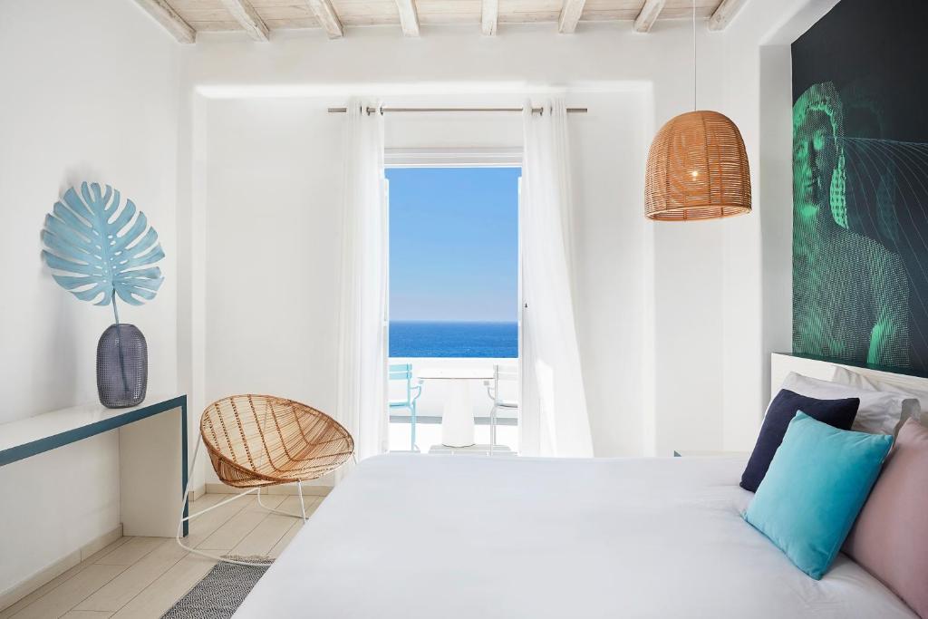 Двухместный (Классический двухместный номер с 1 кроватью или 2 отдельными кроватями с видом на море) отеля Kouros Hotel & Suites, Миконос