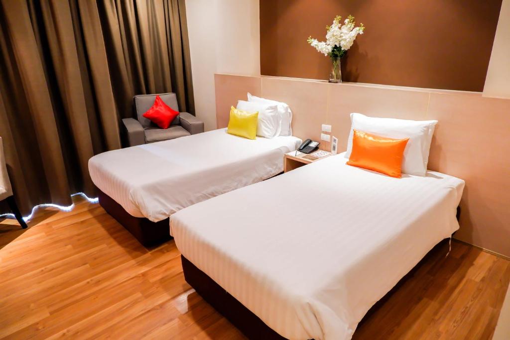 Двухместный (Улучшенный двухместный номер с 1 кроватью или 2 отдельными кроватями) апарт-отеля Park Village Rama II, Бангкок