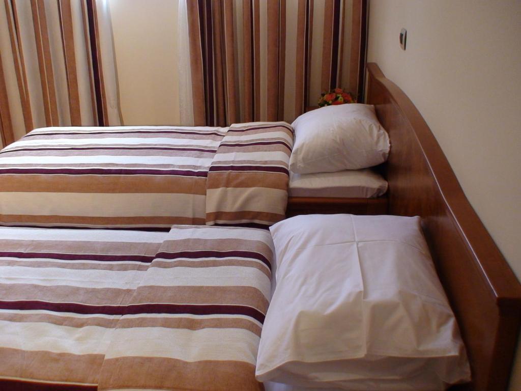 Двухместный (Двухместный номер с 1 кроватью или 2 отдельными кроватями) отеля Hotel BaMBiS, Подгорица