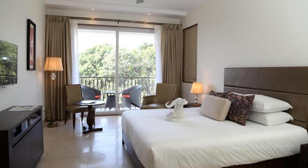 Двухместный (Двухместный номер Делюкс с 1 кроватью или 2 отдельными кроватями) отеля Lemon Tree Hotel Candolim, Кандолим