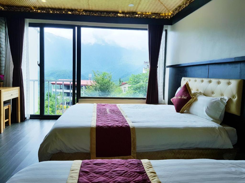 Четырехместный (Четырехместный номер с видом на горы) отеля Phuong Nam Hotel with mountain view, Сапа