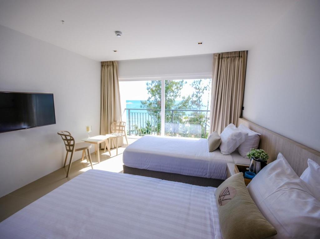 Двухместный (Улучшенный двухместный номер с 2 отдельными кроватями) отеля Worita Cove Hotel, Паттайя