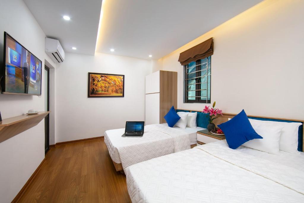 Двухместный (Улучшенный двухместный номер с 2 отдельными кроватями) отеля Hanoi Golden Hotel, Ханой
