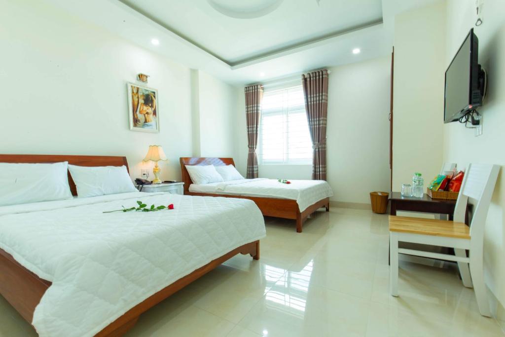 Семейный (Семейный номер Делюкс) отеля Biển Ngọc Hotel, Вунгтау