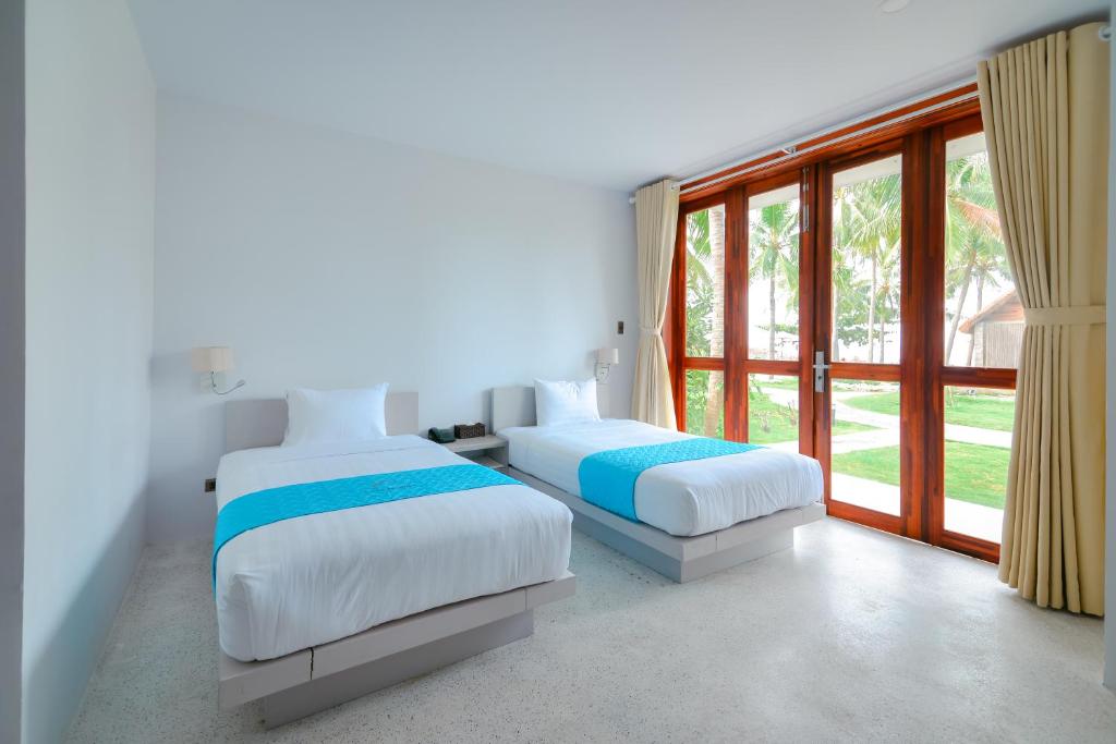 Двухместный (Двухместный номер с 2 отдельными кроватями и видом на бассейн) курортного отеля Casa Marina Resort, Куинён