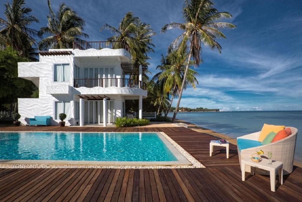 Двухместный (Номер Делюкс с видом на пляж и спа-услугами) курортного отеля Villa Nalinnadda, Самуи