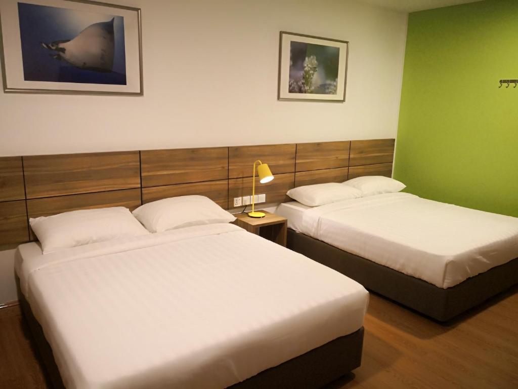 Двухместный (Двухместный номер Делюкс с 2 отдельными кроватями) курортного отеля Aman Tioman Beach Resort, Тиоман
