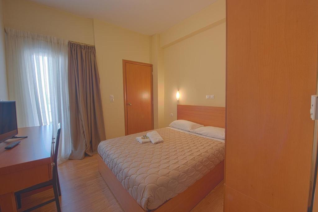 Двухместный (Стандартный двухместный номер с 1 кроватью или 2 отдельными кроватями и балконом) отеля Grand Olympic Hotel Loutraki, Лоутраки