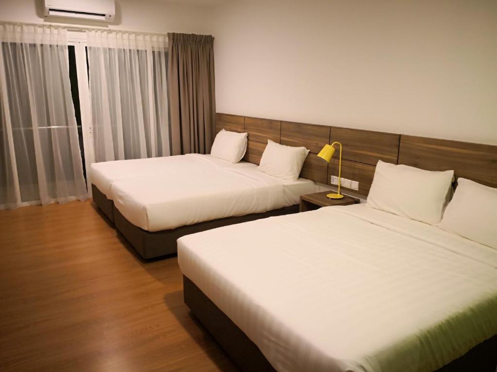 Трехместный (Клубный трехместный номер Делюкс) курортного отеля Aman Tioman Beach Resort, Тиоман