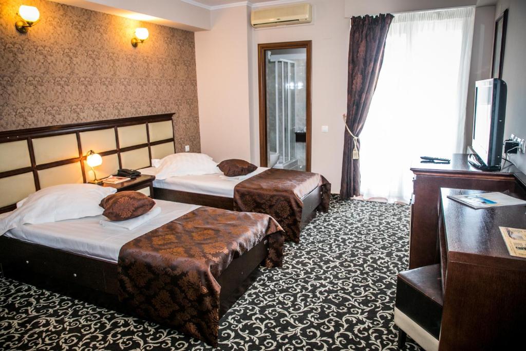 Двухместный (Двухместный номер с 2 отдельными кроватями) отеля Hotel Megalos, Констанца